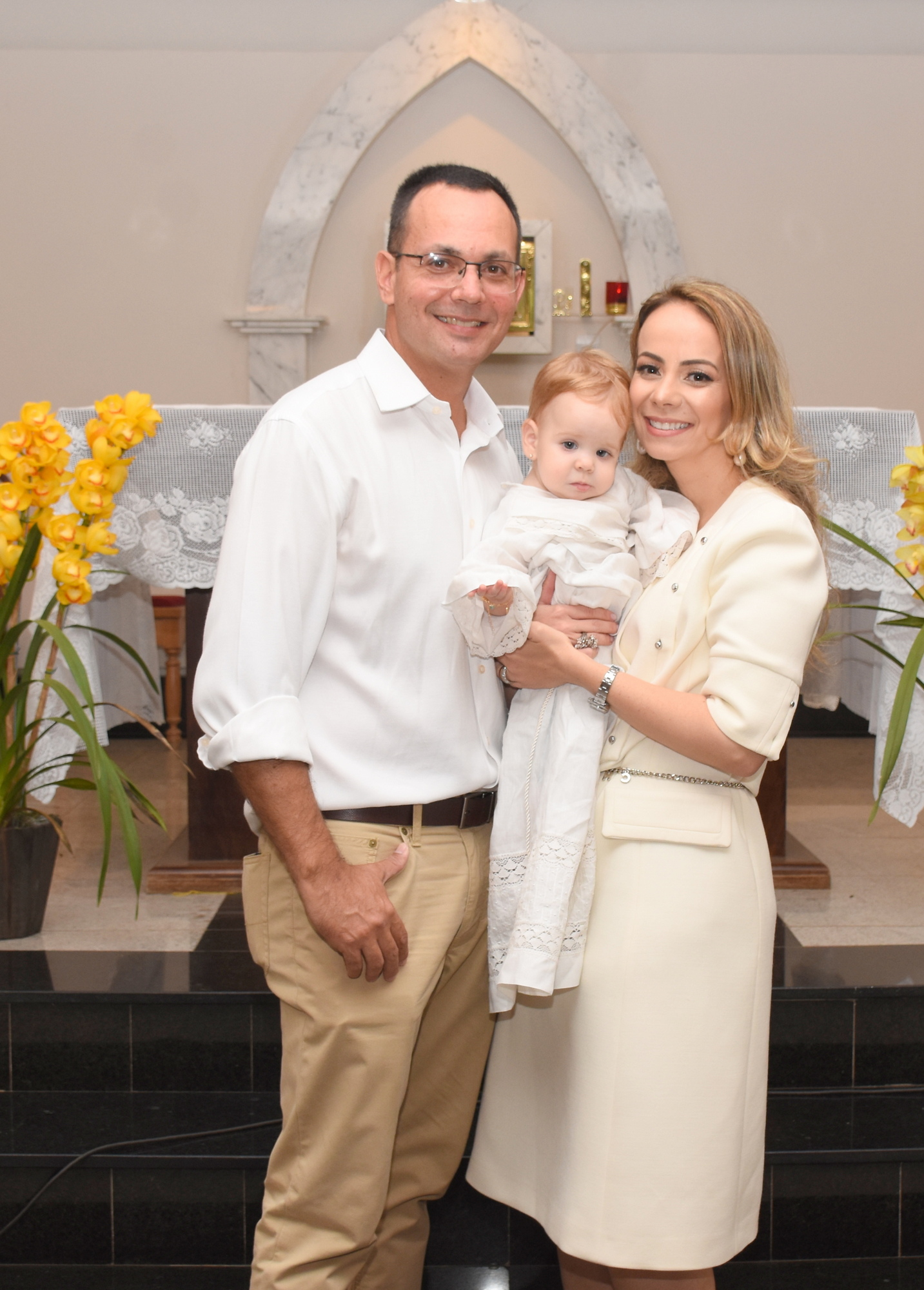 Melissa e Adriano Rezende com Maria Clara